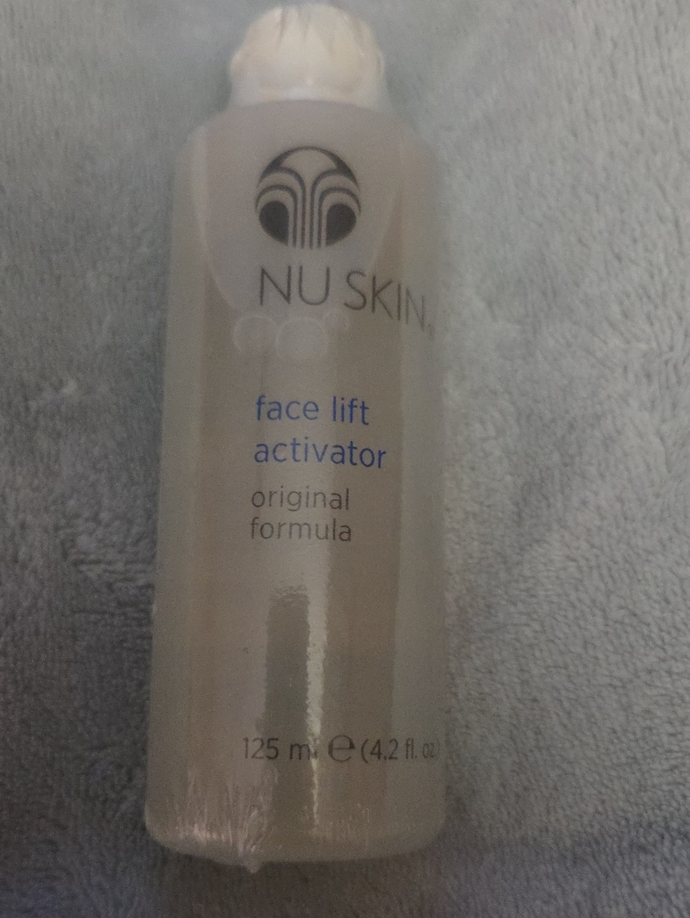 Skin Face Lift Activator - White with Blue Text NWOT